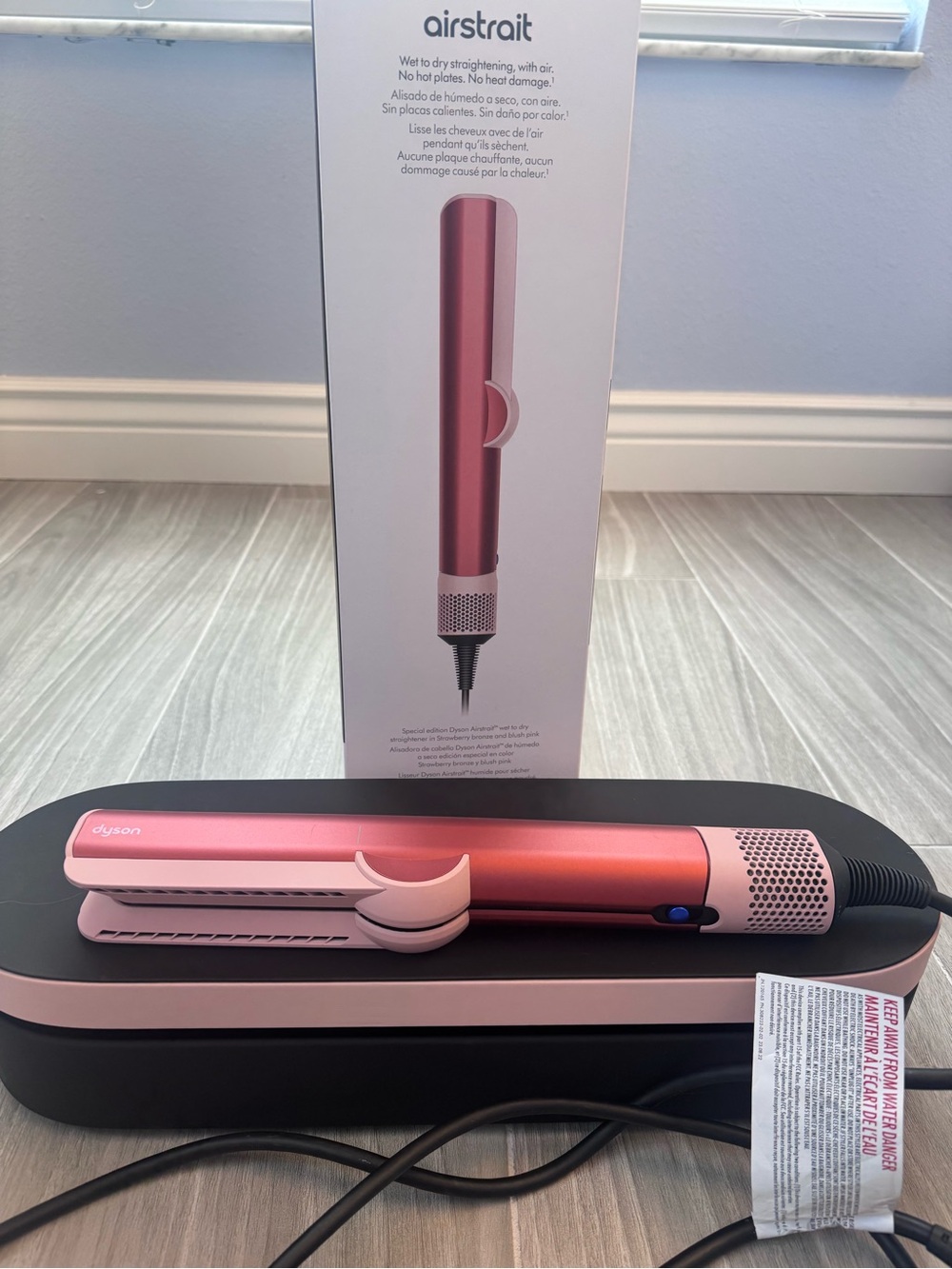 Dyson airstrait special edition strawberry bronze and pink